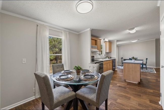 Another view of the dining room | Image 25
