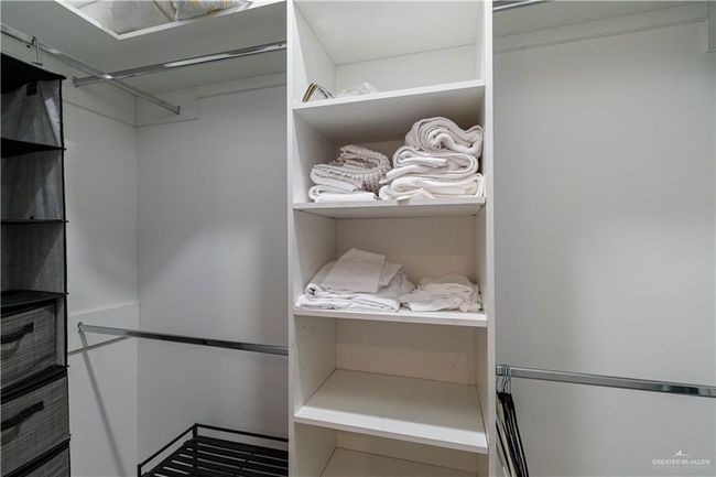 View of spacious closet | Image 11