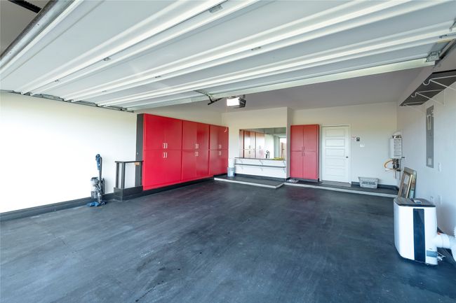 Garage featuring electric panel | Image 14