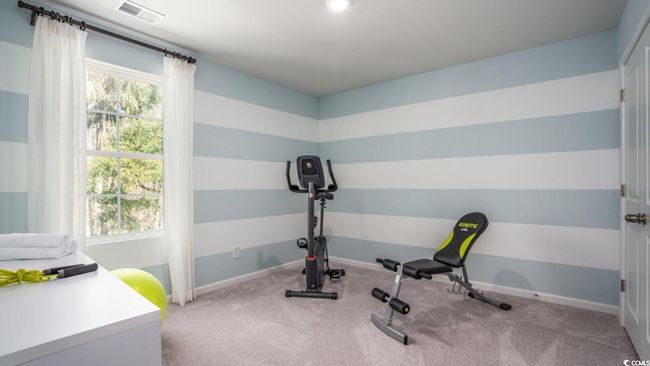Workout area featuring carpet flooring and baseboards | Image 18