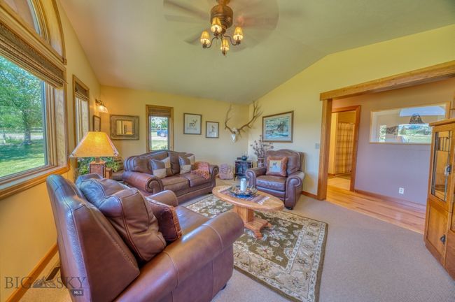 Family room with propane freestanding stove | Image 15