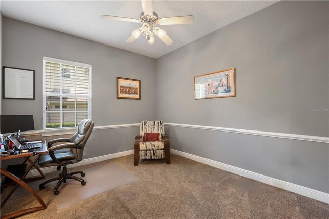 Bedroom 2, currently used as an additional office. It does have a closet. | Image 30