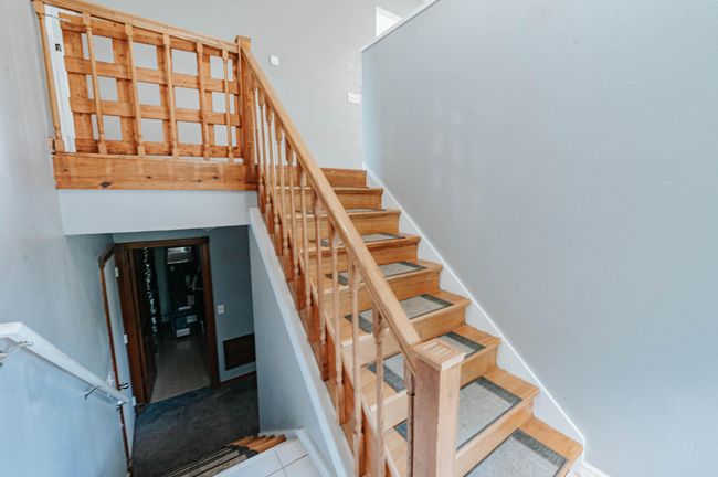 View of stairs from entry | Image 16