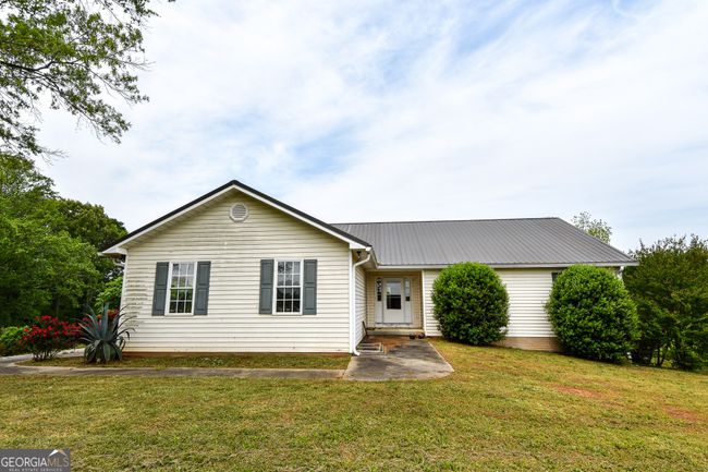 387 Fredonia Church Rd, Home with 3 bedrooms, 2 bathrooms and 2 parking in BARNESVILLE GA | Image 8