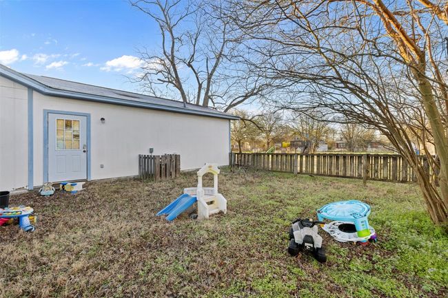 View of yard featuring fence | Image 4