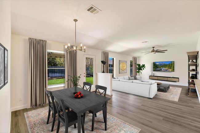 Virtually staged breakfast and family room. | Image 14
