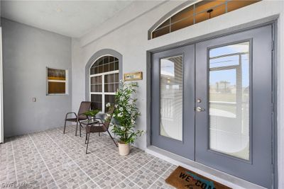 Doorway to property featuring french doors | Image 3