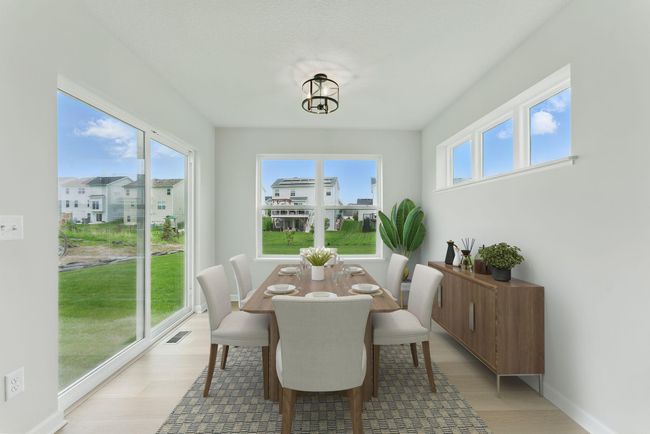 The morning room offers additional space for dining or sitting area! | Image 4