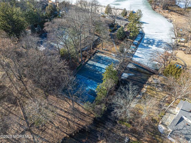 Pines Lake in Wayne, New Jersey, is a private lakeside community that offers a harmonious blend of natural beauty and modern amenities. Established in 1927, this serene enclave is centered around a picturesque man-made lake, providing residents with year-round recreational opportunities. | Image 55