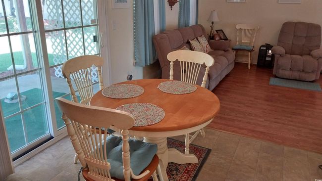 Dining area featuring plenty of natural light | Image 6