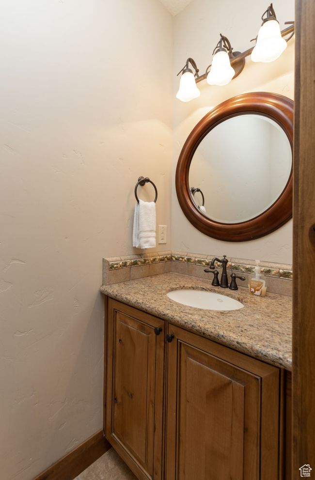 Bathroom with vanity and baseboards | Image 32