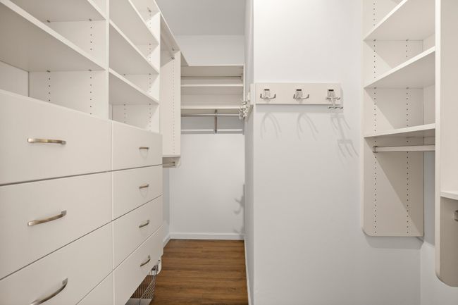 Oversized walk in closet with custom storage! | Image 22