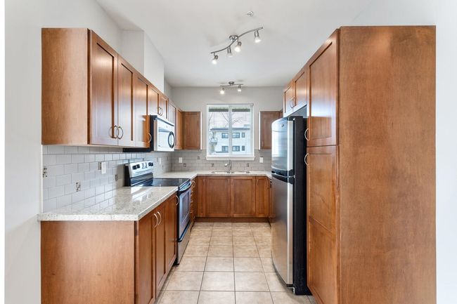 406 - 2336 Whyte Ave, Condo with 3 bedrooms, 2 bathrooms and 2 parking in Port Coquitlam BC | Image 7