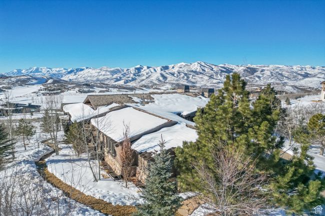 Aerial looking over home to golf, village center, then the entire Wasatch Back Range | Image 8