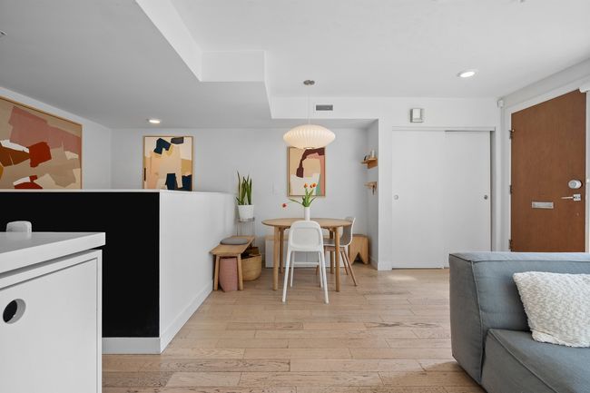 Interior space with light wood-style floors, baseboards, visible vents, and recessed lighting | Image 5
