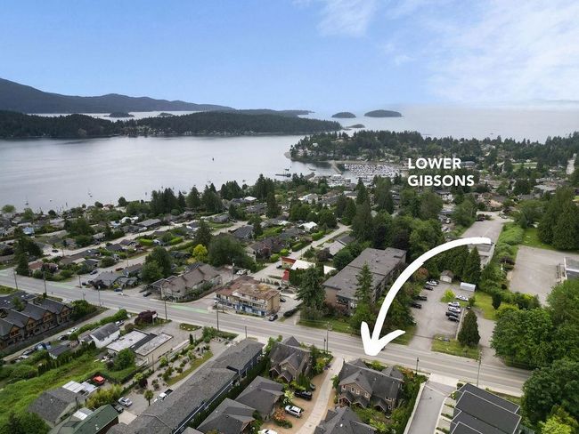 Aerial view Islandview Lanes and surrounding area with a water and mountain view | Image 37