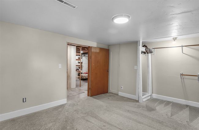 Finished basement featuring carpet floors and baseboards | Image 30