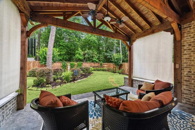 Impressive cedar addition provides additional outdoor living space. | Image 27