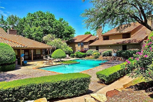 Community pool with a patio | Image 16