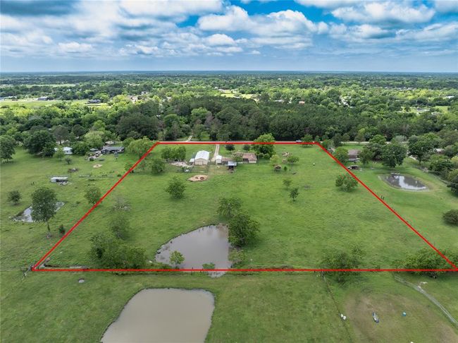 Whether you're seeking ample space for your family to spread out and enjoy or dreaming of starting a hobby farm, this property seems to have it all covered. With its generous acreage and peaceful setting on a dead-end street, there's plenty of room for various activities and pursuits | Image 45