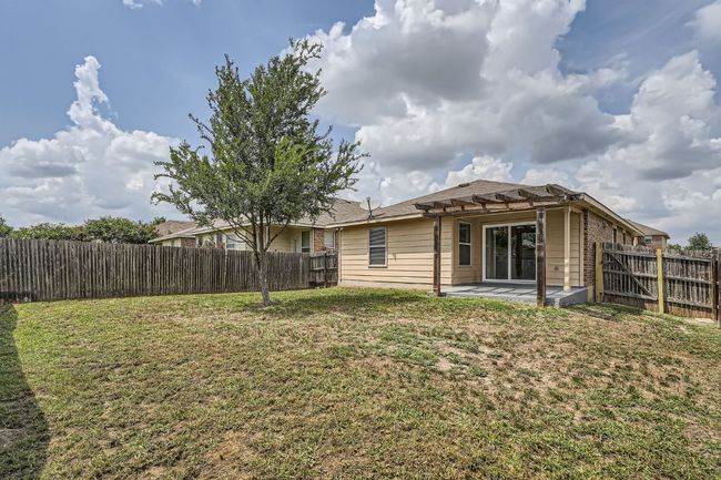 Back of property featuring a pergola and a patio | Image 11