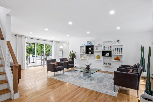 Living area featuring stairway, light wood-type flooring, and recessed lighting | Image 5