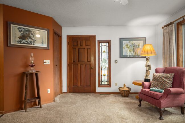 Entryway with carpet floors | Image 19