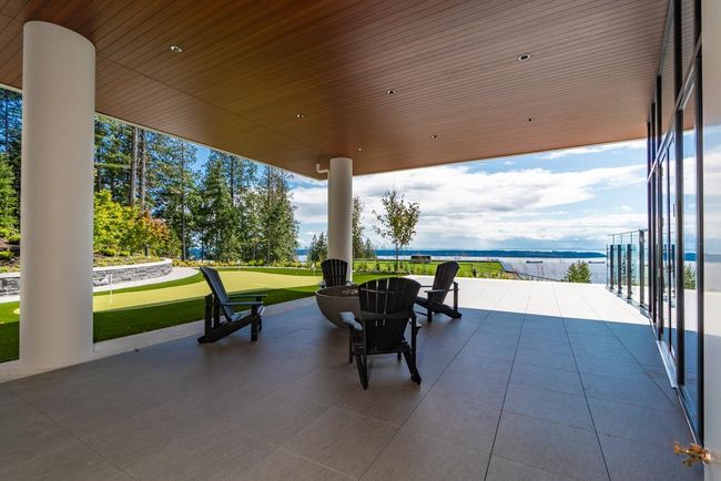View of patio featuring a putting area | Image 36
