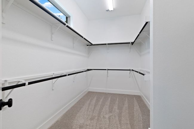 Walk-in closet in Primary Bedroom | Image 24