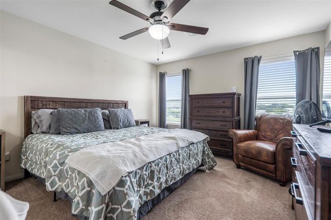 Spacious primary bedroom | Image 16
