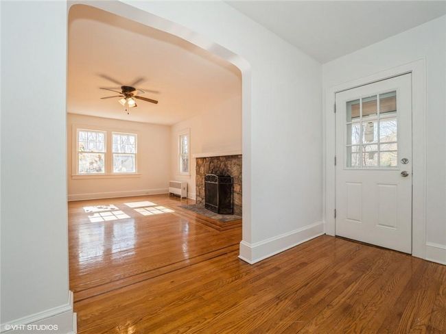 The living room is light and bright and generously sized. | Image 24