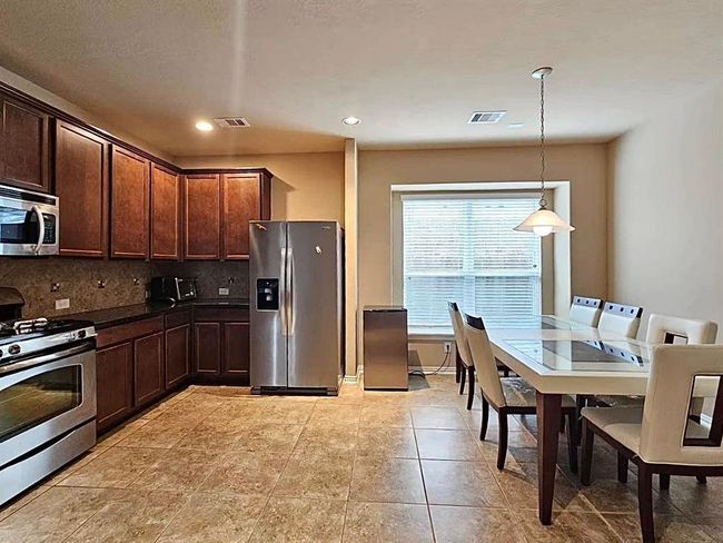 9617 Landon Lake Dr, House other with 4 bedrooms, 3 bathrooms and 2 parking in Pearland TX | Image 6