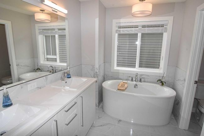 828 West Lakeview Drive, House other with 3 bedrooms, 3 bathrooms and 4 parking in Chestermere AB | Image 25