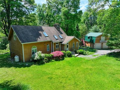 View of front facade featuring a garage and a front yard | Image 3