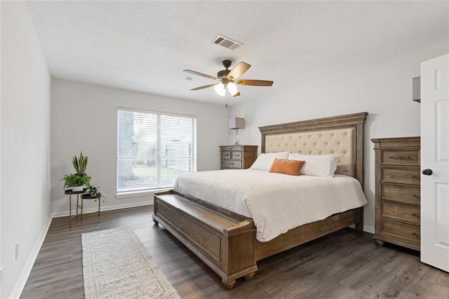 Primary bedroom is on first floor. Spacious room which can accomodate large furniture. | Image 25