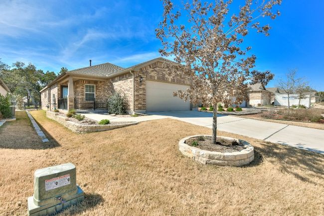 Front yard is landscaped and has in-ground sprinklers. | Image 4