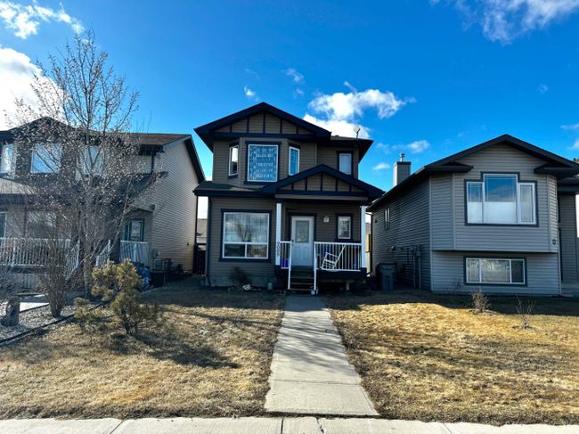 9009 93 Avenue, Home with 4 bedrooms, 3 bathrooms and 2 parking in Grande Prairie AB | Image 1