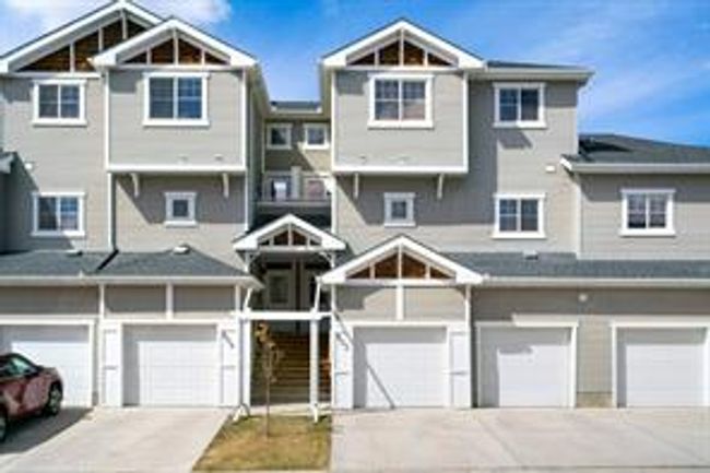 803 - 281 Cougar Ridge Dr Sw, Home with 3 bedrooms, 1 bathrooms and 2 parking in Calgary AB | Image 1