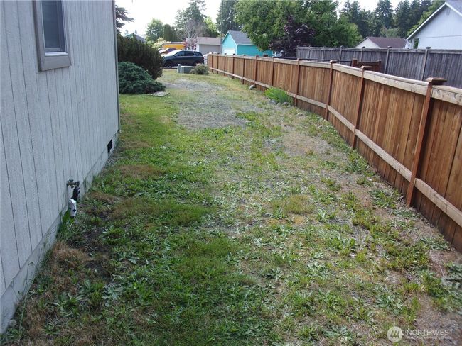 North side of dwelling has plenty of room for an RV or boat. | Image 7