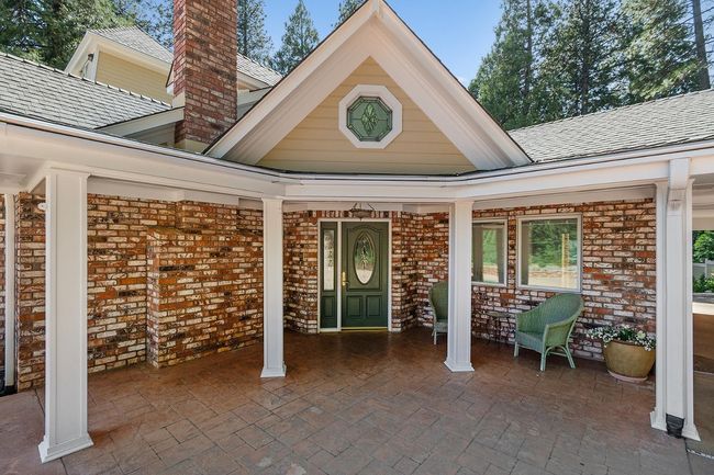 Inviting and Unique front brick entry, with pavers. | Image 13
