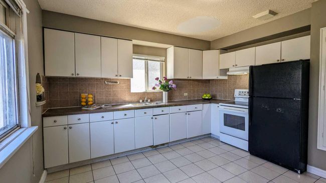 3414 Centre Street N, Home with 4 bedrooms, 2 bathrooms and 4 parking in Calgary AB | Image 6