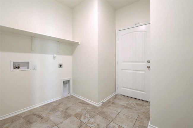 Laundry room from the garage | Image 35
