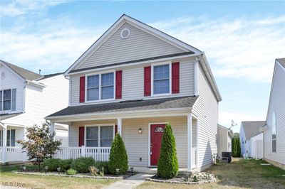 View of front of home featuring central AC unit and a porch | Image 2