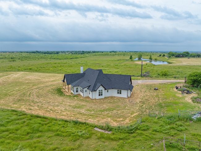 Overview of rural landscape featuring a nearby body of water | Image 32