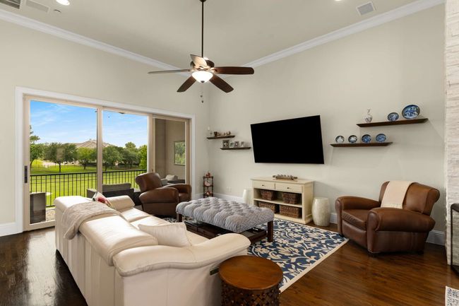 Living room perfect for relaxing or entertaining. | Image 12