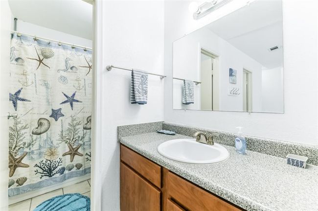 Primary bathroom consists of a single sink and a tub/shower combo. | Image 17