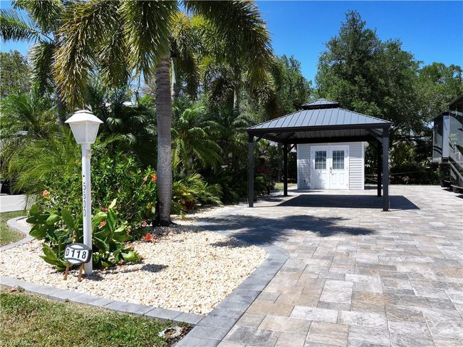 View of patio / terrace with a gazebo and decorative driveway | Image 13