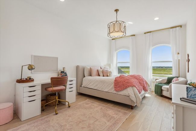 Bedroom featuring a desk, light wood-type flooring, and recessed lighting | Image 28