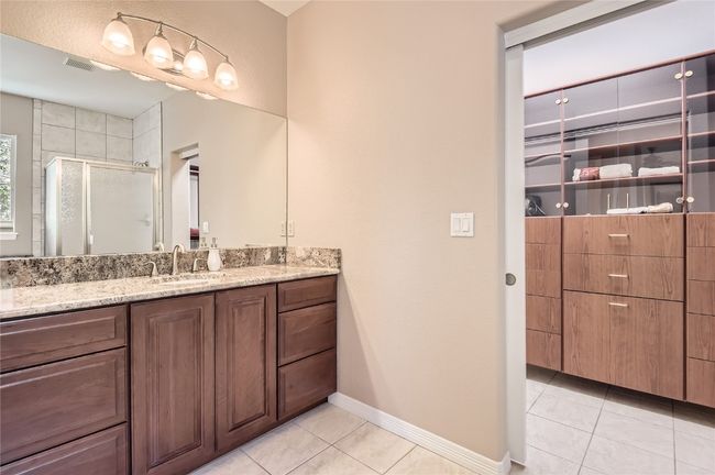 Primary Bathroom vanity area with a second sink plumbed in. | Image 12