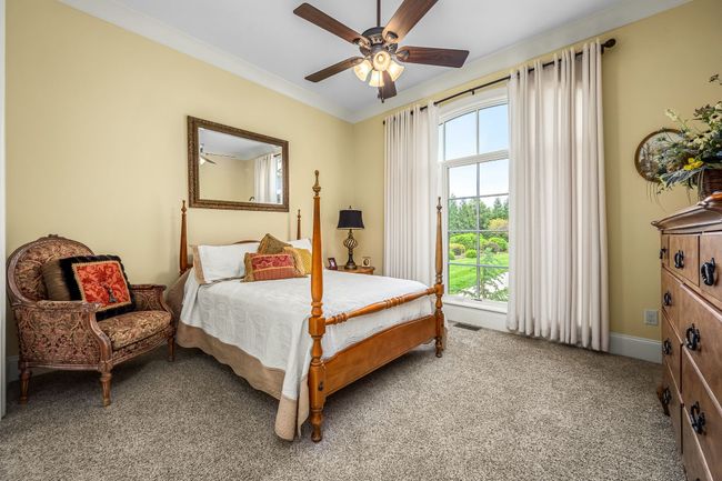 A guest room with a shared Jack-and-Jill bathroom can be a practical and convenient setup, especially for families or frequent hosts. | Image 46